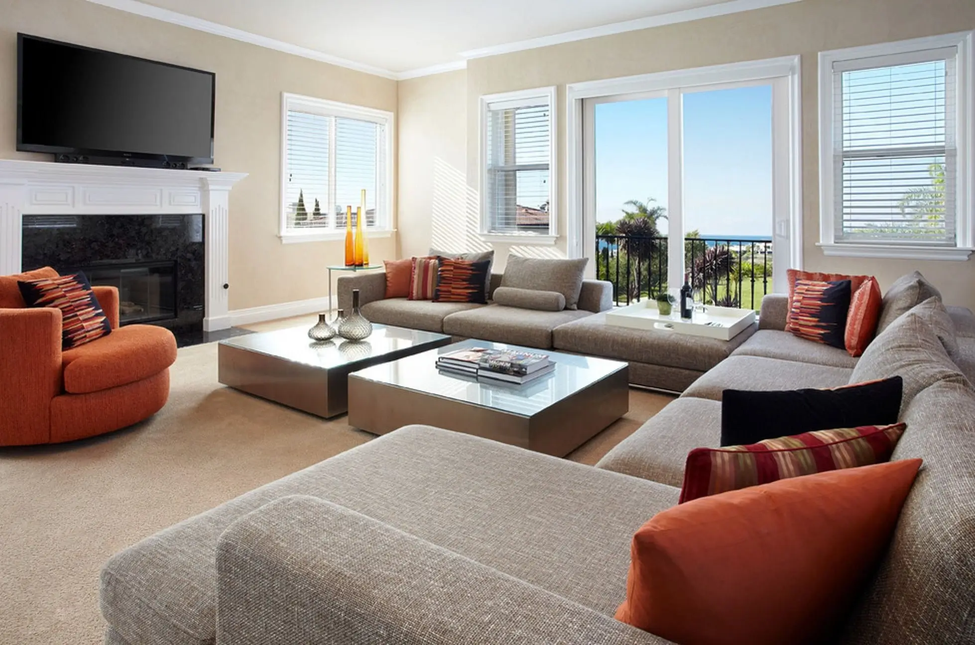 A beautifully arranged new living room with a comfortable sofa.