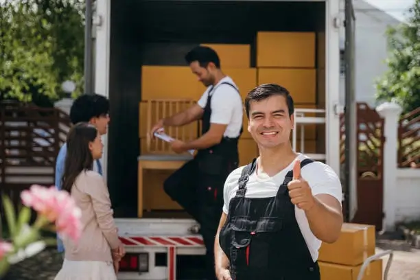 A friendly ShiftForward mover smiling