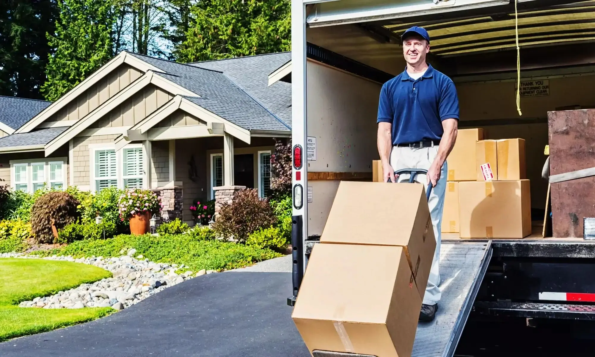A mover carefully handling a box